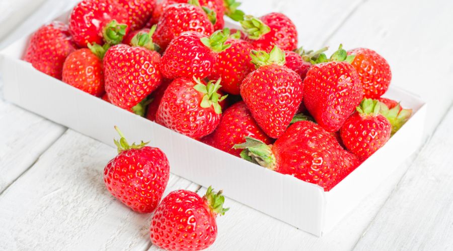The warmest spring start for 100 years has led to a crop flush of British strawberries, Tesco confirms.