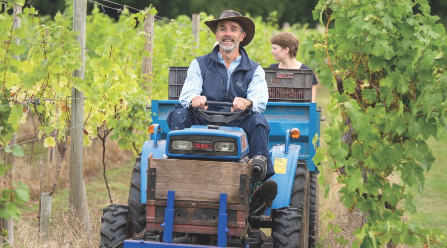 Tim of Astley Vineyard working on site on tractor